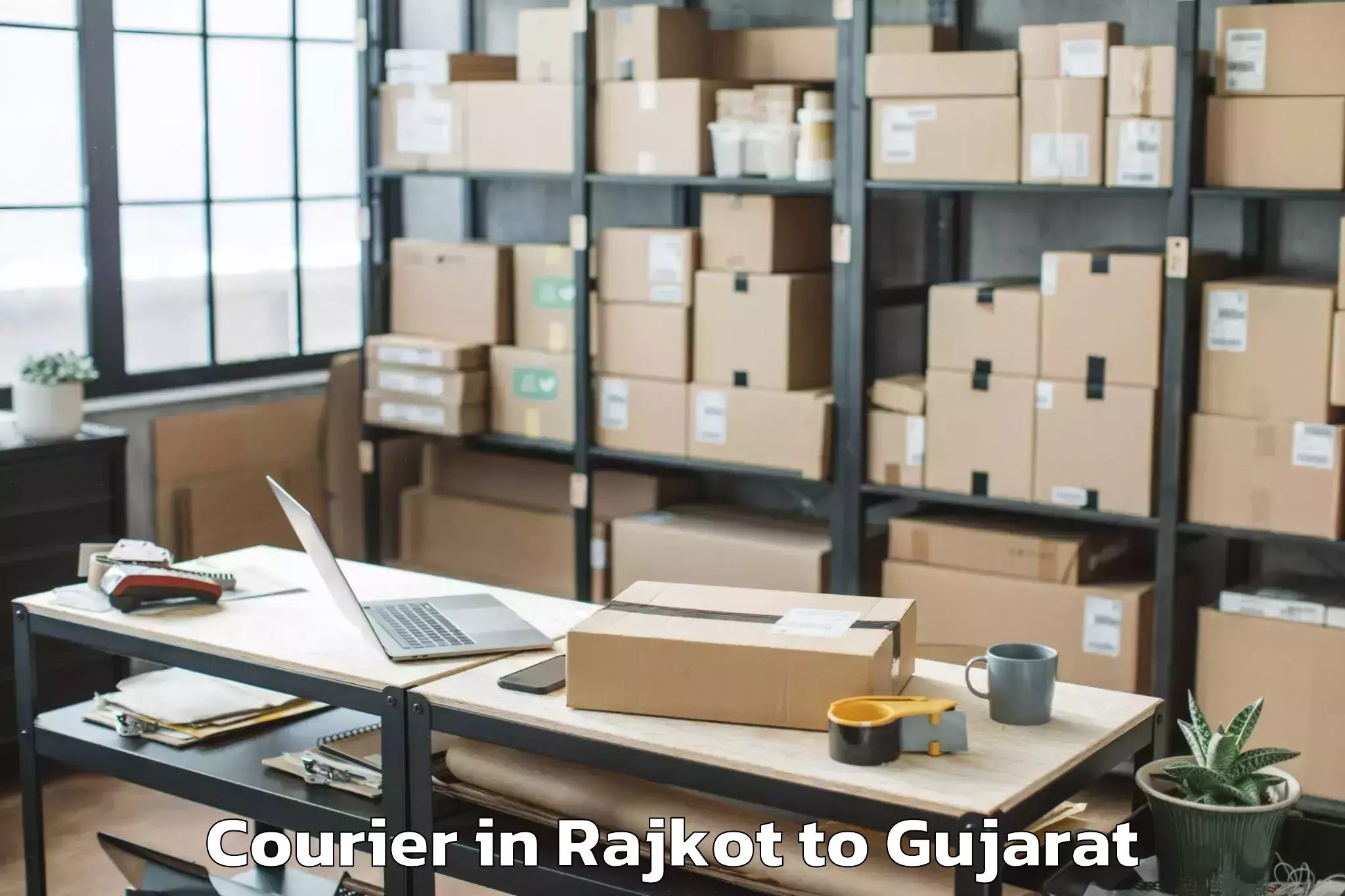 Book Rajkot to Dhoraji Courier Online